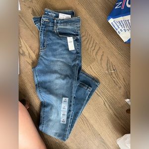 Kids size 16 stretch light wash jeans adjustable waist.